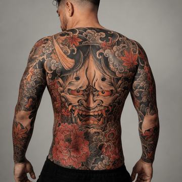 Full back tattoo with hannya mask and peony flowers