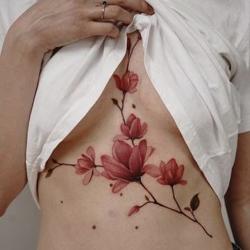Tatuiruotės ant krūtinės moterims