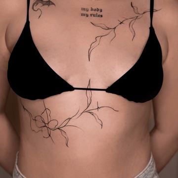 Tatuiruotės ant krūtinės moterims