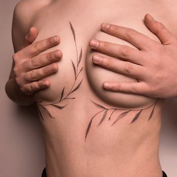 Tatuiruotės ant krūtinės moterims