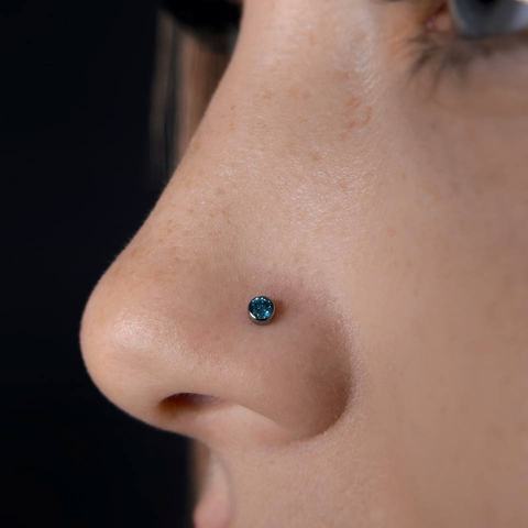Nostril piercing: a subtle nose piercing that adds a stylish accent and naturally complements the facial features.